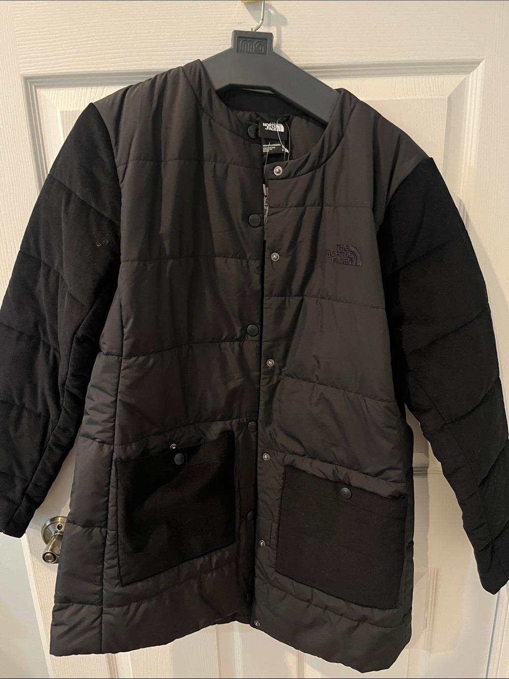 The North Face Black Quilted Snap-Front Insulated Jacket